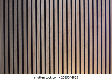 wall with wooden slats aligned for soundproofing