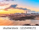 Walled city Saint-Malo with St Vincent Cathedral at sunrise at high tide. Saint-Maol is famous port city of Privateers is known as city corsaire, Brittany, France