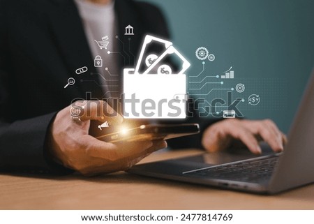 Wallet digital payment icon on internet mobile banking, online wallet business concept. Businessman hold mobile phone, computer laptop online money transaction application. Bank e-commerce investment