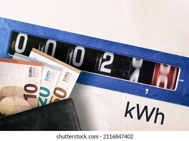 Wallet With Euros Paper Money And Electricity Meter Measures