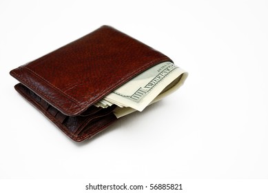 Wallet Full Of Money. Isolated On White.