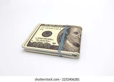 Wallet with fun American Dollar banknote print on it in front of white background creative utility gadget concept for stock and fund investments credit debt and debit money loan and finances articles