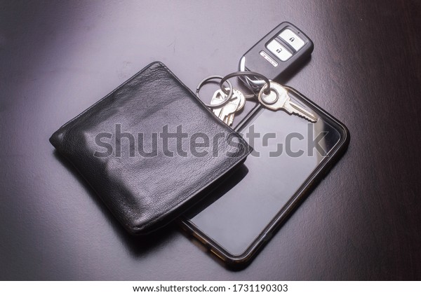 Wallet mobile phone keys used for daily\
activities for home work and\
recreation