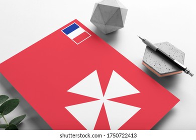 Wallis And Futuna flag on minimalist paper background. National invitation letter with stylish pen on stone. Communication concept. - Shutterstock ID 1750722413