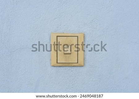 Wall-mounted light switch with white plastic cover