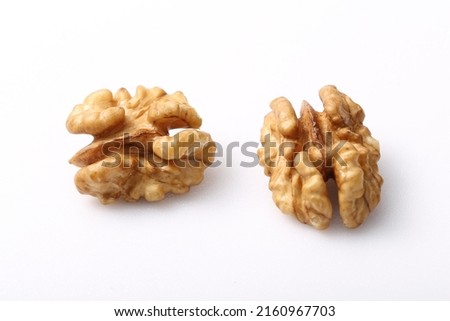 Wallnuts  brain  nuts  shell isolated on white background. Raw  nut  cracked  wallnut snack food  ingredient