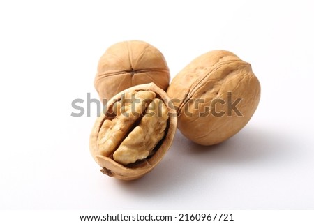 Wallnuts  brain  nuts  shell isolated on white background. Raw  nut  cracked  wallnut snack food  ingredient