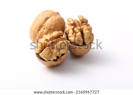 Wallnuts  brain  nuts  shell isolated on white background. Raw  nut  cracked  wallnut snack food  ingredient