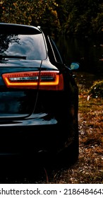 Wallpaper Black Audi A6 C7 with LED taillights in the nature