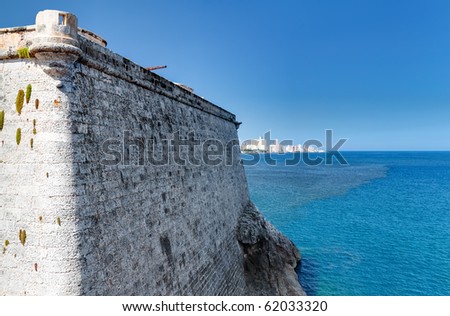 The walls of El Morro in Havana, Cuba with the city and the ocean on the background