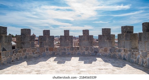 The walls  over the city. Completed between the 11th and 14th centuries. They  are the principal historic feature. These fortifications are the most complete in all Spain. Morning walk on a sunny day.