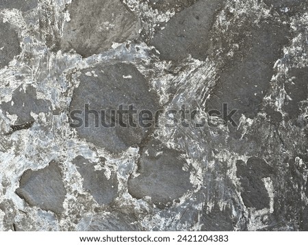 walls textured with stone assemblages
