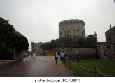 Walls And Towers Of Windsor Castle By  Heavy Rain, England