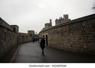 Walls And Towers Of Windsor Castle By  Heavy Rain, England