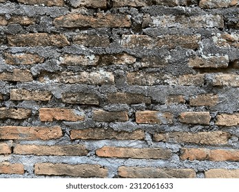 the walls were made of red bricks, and some of them were worn with age - Shutterstock ID 2312061633
