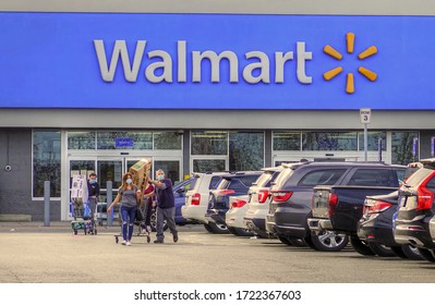 Walmart store shoppers wear corona virus protective masks, Peabody Massachusetts USA, May 2, 2020                             