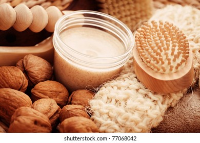 walnut body scrub with massage glove - beauty treatment