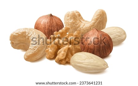 Walnut, cashew, blanched almond and hazelnut  isolated on white background. Nut mix. Package design element with clipping path