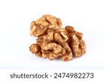 Walnut kernel, Closeup of big shelled walnuts pile. Top view of bunch of nutrient fresh walnuts without shell isolated on white background.