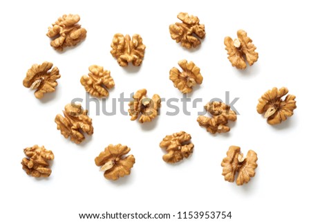Walnut kernels isolated on white background. Top view.