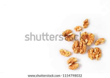 Walnut kernels isolated on white background. 