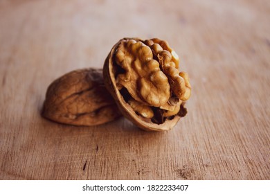 Walnut and nutshell on the wooden table