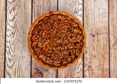 Walnut Pie Over A Tree Background