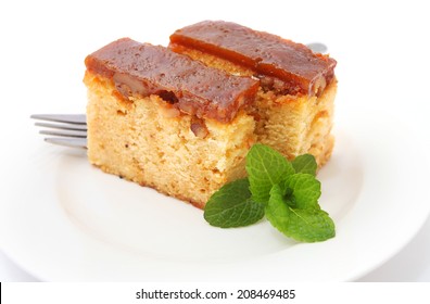 Walnut And Salted Caramel Cake Isolated On White