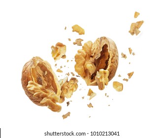 Walnut is torn to pieces on white background 