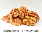 Walnuts, a bunch of peeled walnuts on a white background.
