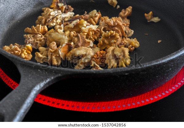 Walnuts Cooking Cast Iron Frying Pan Stock Photo Edit Now 1537042856