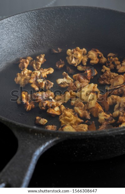 Walnuts Cooking Cast Iron Frying Pan Food And Drink Stock Image