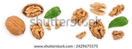 Walnuts isolated on white background. Top view. Flat lay