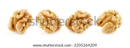 Walnuts kernel in closeup on white background