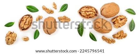 Walnuts with leaf isolated on white background. Top view. Flat lay