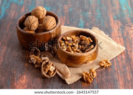 Walnuts are nutrient-rich nuts with a hard shell, offering brain-boosting omega-3s, protein, fiber, and antioxidants for overall health.