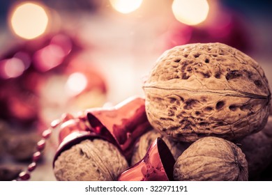 Walnuts On An Old Wooden Table. Christmas Background.