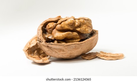 Walnuts are rounded, single-seeded stone fruits of the walnut tree. Cracking a nut.