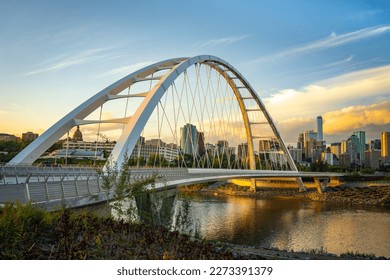 Walterdale suspension bridge and saskatchewan river with skyline in Edmonton Alberta Canada at dusk - Powered by Shutterstock