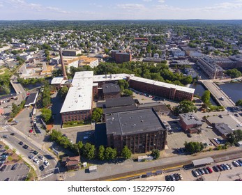 Waltham City Center And Historic Francis Cabot Lowell Mill Next To Charles River Aerial View In Downtown Waltham, Massachusetts, MA, USA.