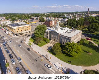 Waltham City Hall And Downtown With Boston Skyline At The Background Aerial View In Downtown Waltham, Massachusetts, MA, USA.