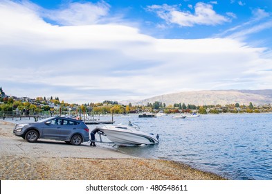 Wanaka,New Zealand - April 29,2016 : A Man Using His Car To Towing The Boat From The Lakeside.