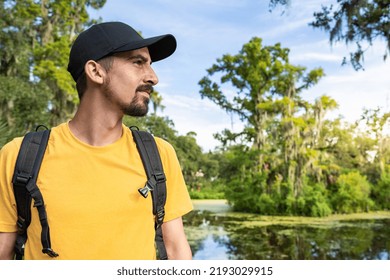 Wanderlust Travel, Tourist With Backpack, Man Enjoying Hiking In Nature, Solo Traveler Backpacker. Swamp, Forest, Mountain. Adventure, Tourism, Freedom Concept.