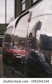 Wandsworth Town, London | UK -  2021.04.03: Shiny Airstream Style Caravan, Trailer Parked On The Sidewalk