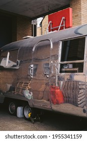 Wandsworth Town, London | UK -  2021.04.03: Shiny Airstream Style Caravan, Trailer Parked On The Sidewalk