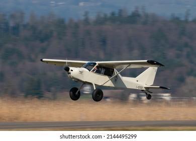 Wangen-Lachen, Switzerland, March 27, 2022 Groppo Trail Propeller Plane Take Off From A Small Airfield