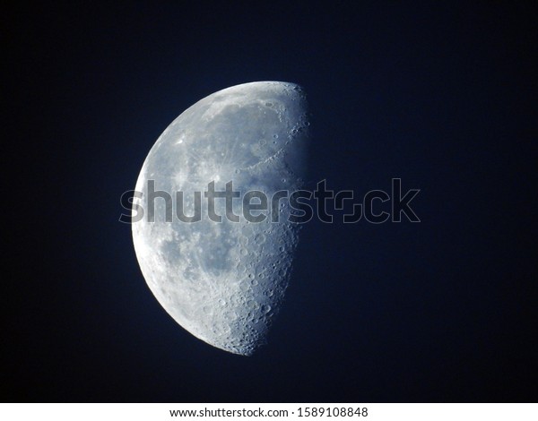 Waning Gibbous moon. A waning gibbous moon is a\
moon between full and last\
quarter.