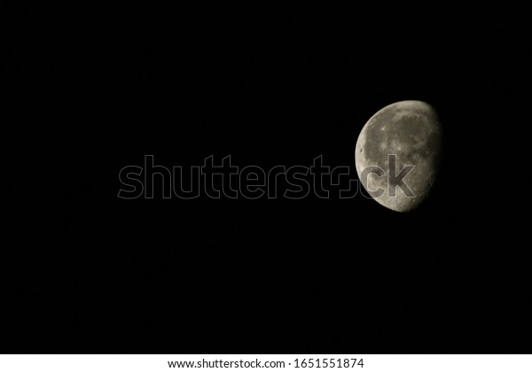 Waning Gibbous Moon in Black\
Sky