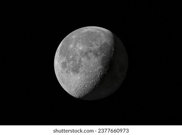 Waning Gibbous moon glowing in the night sky over Ottawa, Canada