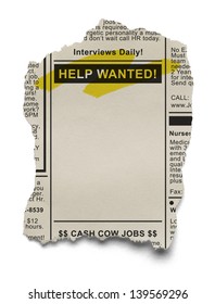 Want Ads for Job Search on Torn News Paper Isolated on White Background.